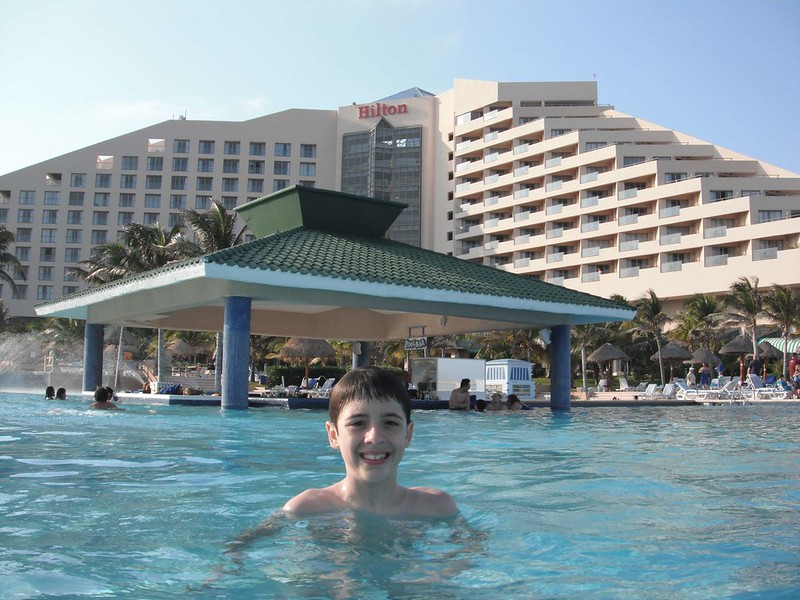 Kid in a pool at Hilton Cancun, Mexico
