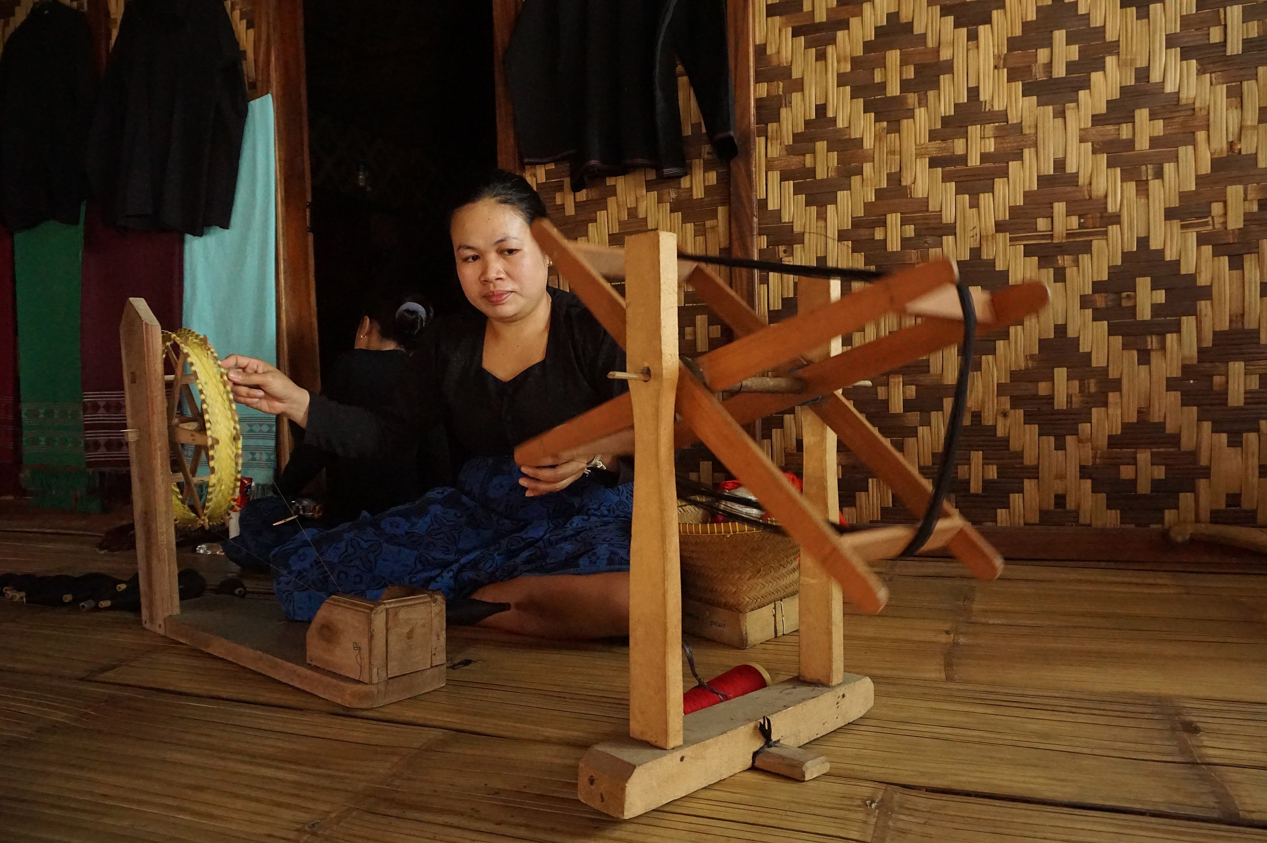 Baduy village, woman Spinning cotton