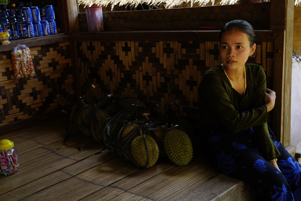 Baduy woman in her house