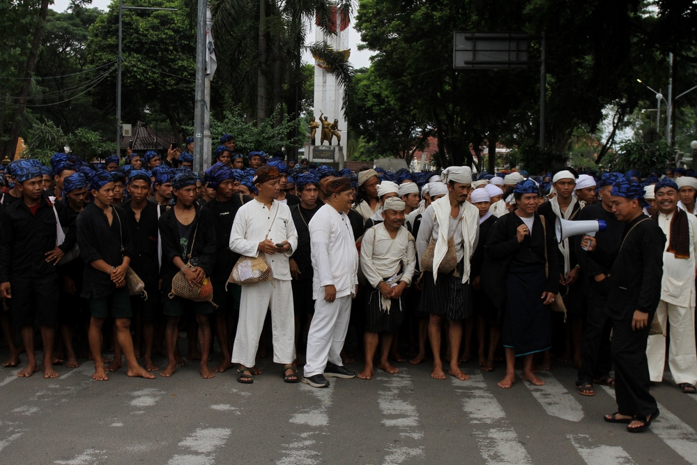 Baduy people in different traditional clothes