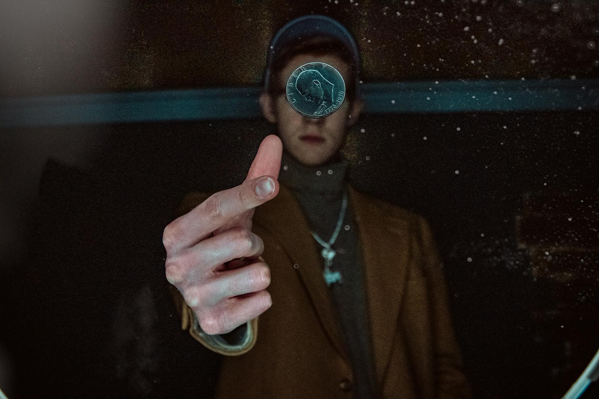 Person throwing a coin