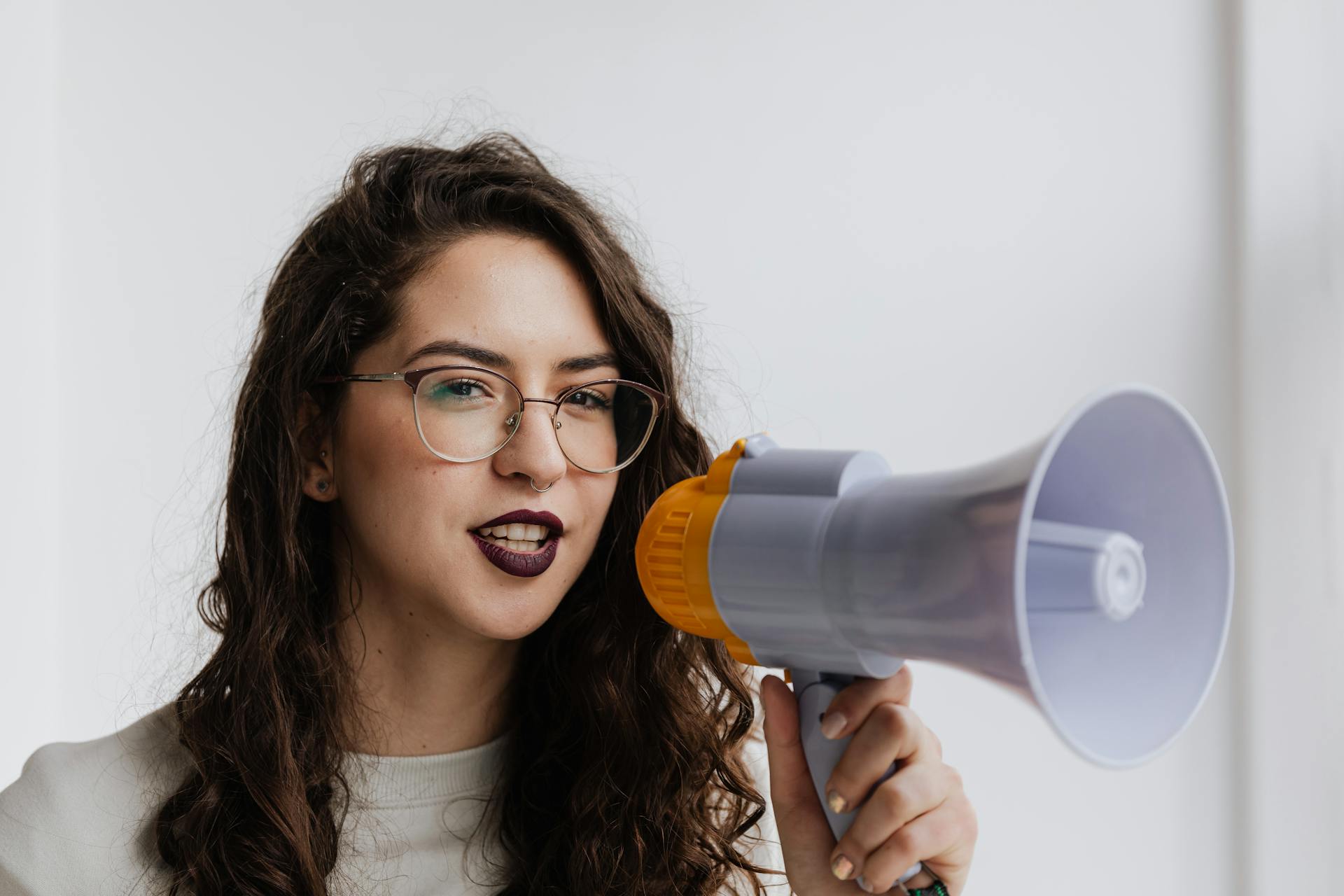Woman talking through megaphone