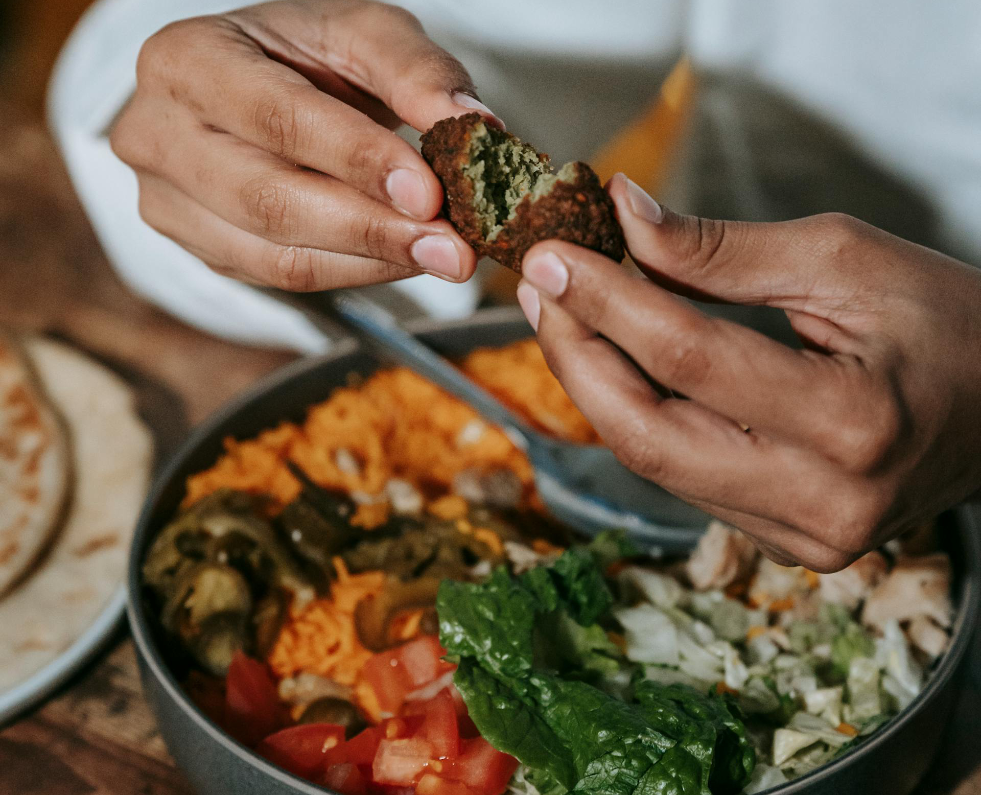 man eating with his hands