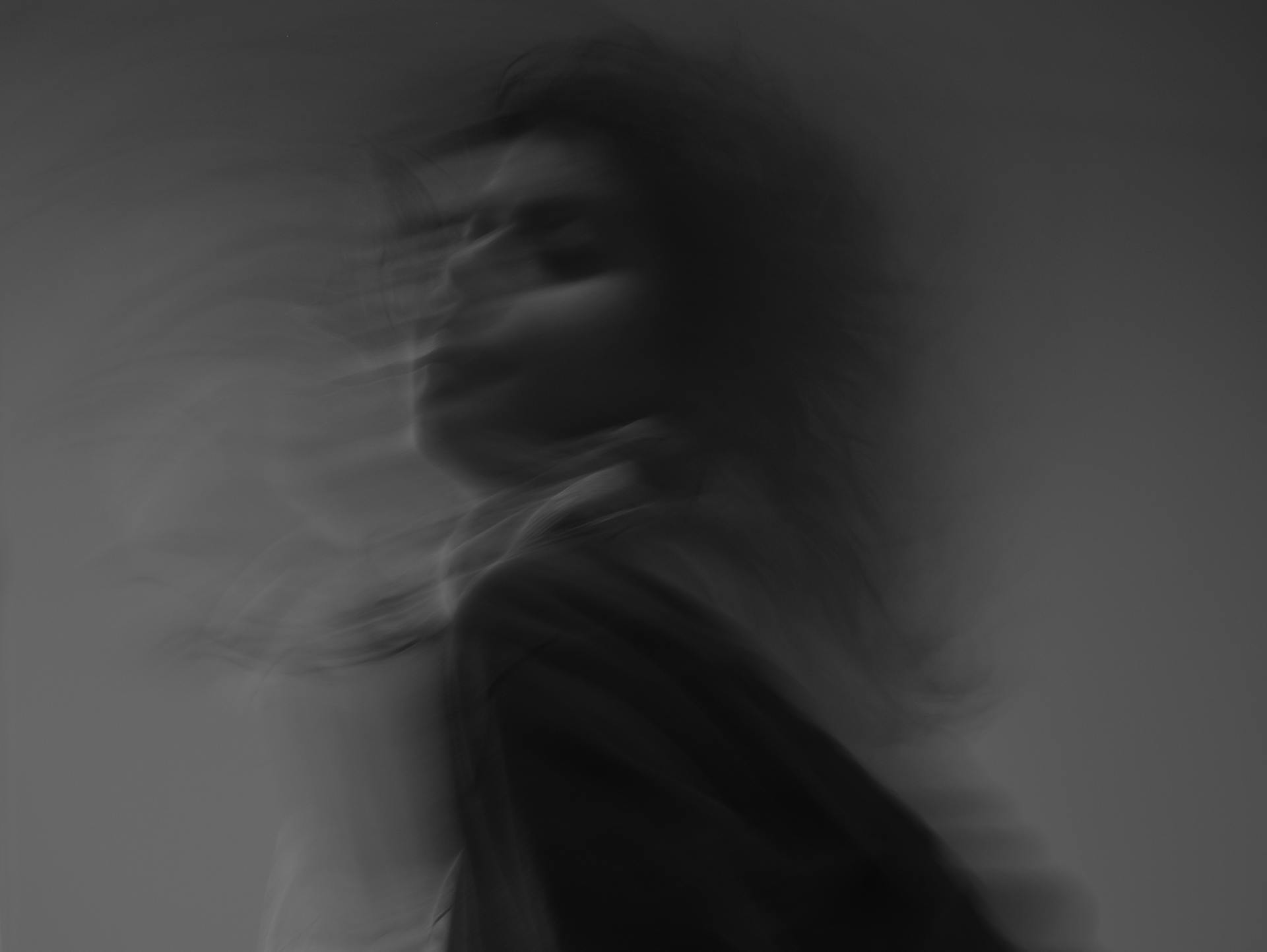 blurred picture of woman moving, ghost