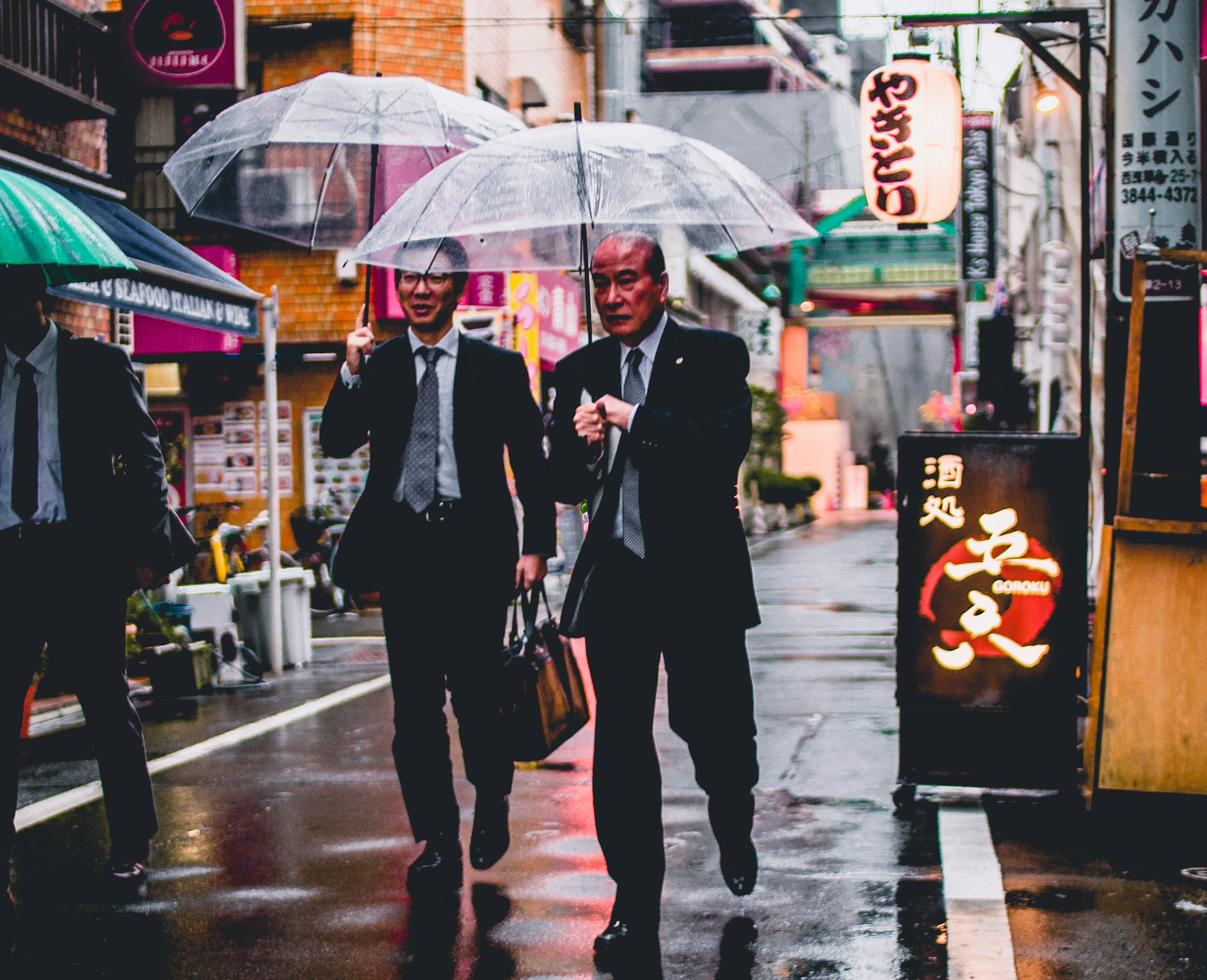 Two businessmen walking on a street