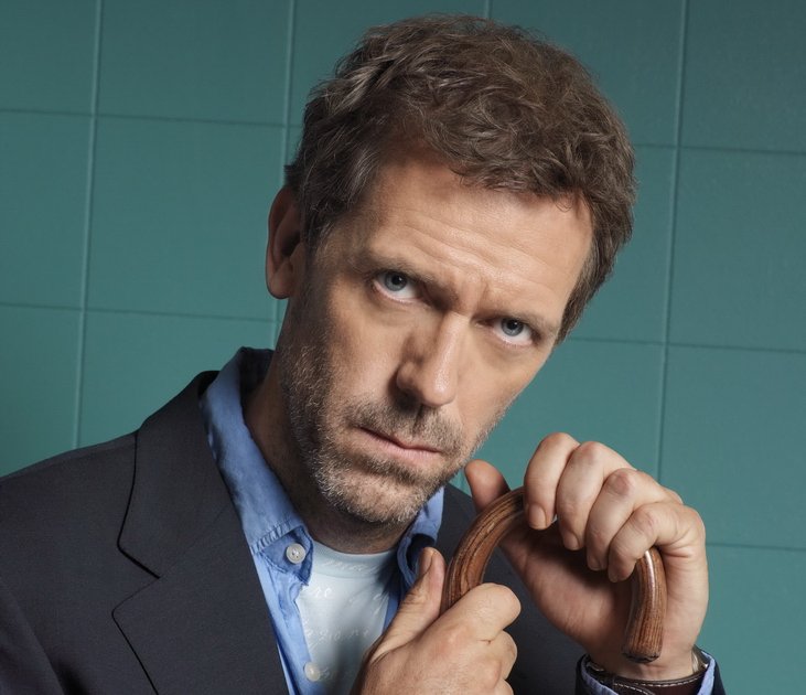 Portrait Photo of the Actor Hugh Laurie as Dr Greg House facing the camera