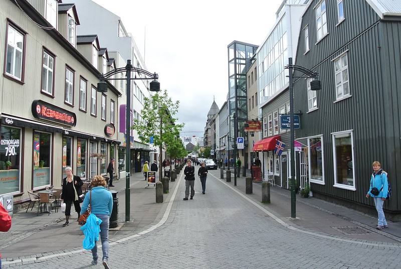 Photo of Tourists walking on the streets in Reykjavik