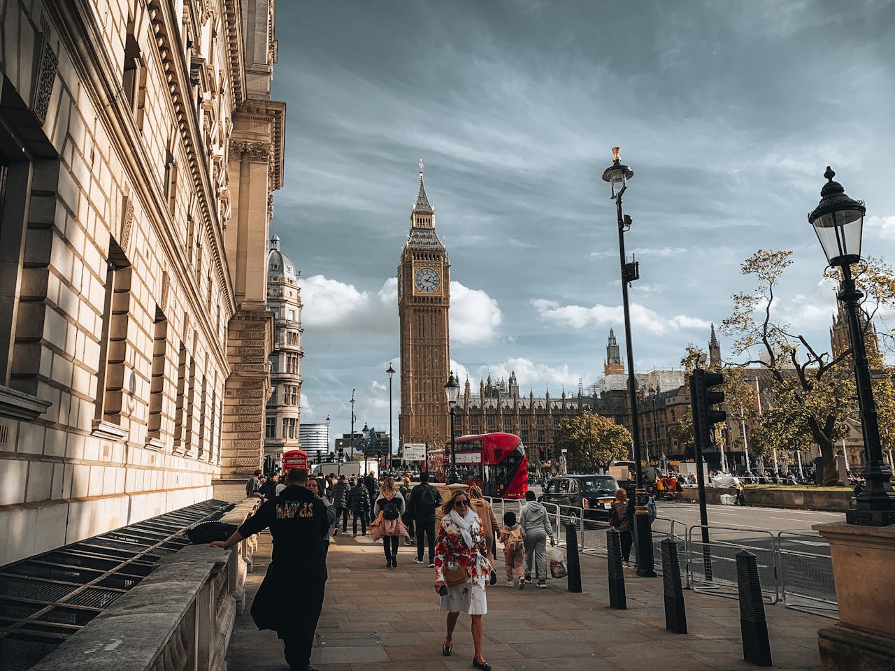 Photo of People walking on the streets of London.