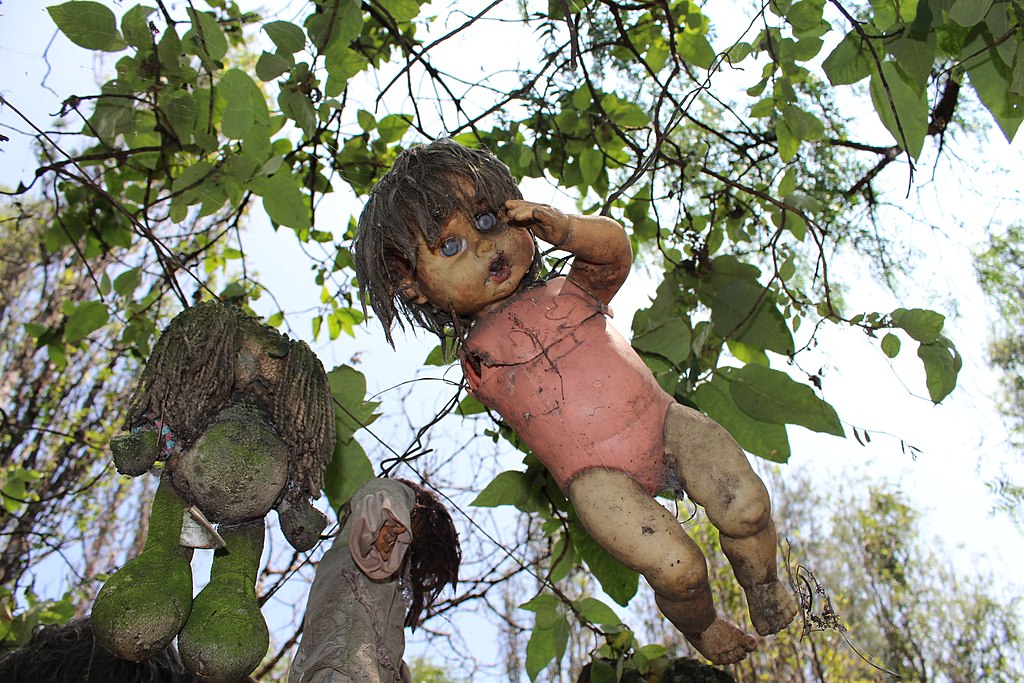 Photo of Creepy old dolls in the abandoned Island of the Dolls, Xochimilco, Mexico