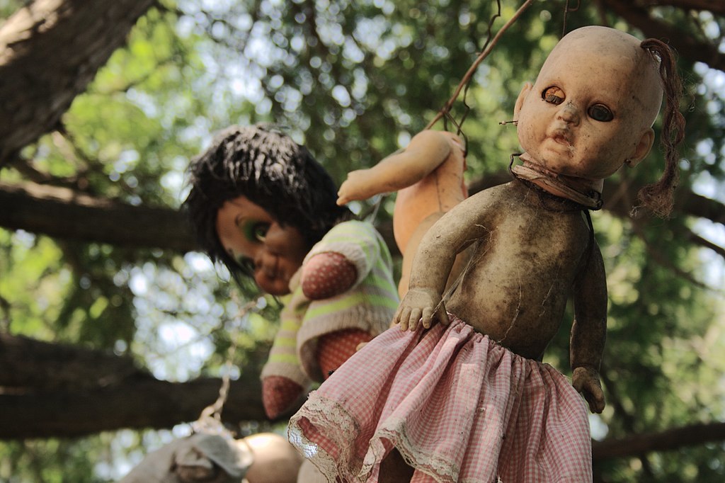 Photo of Creepy old dolls in the abandoned Island of the Dolls, Xochimilco, Mexico