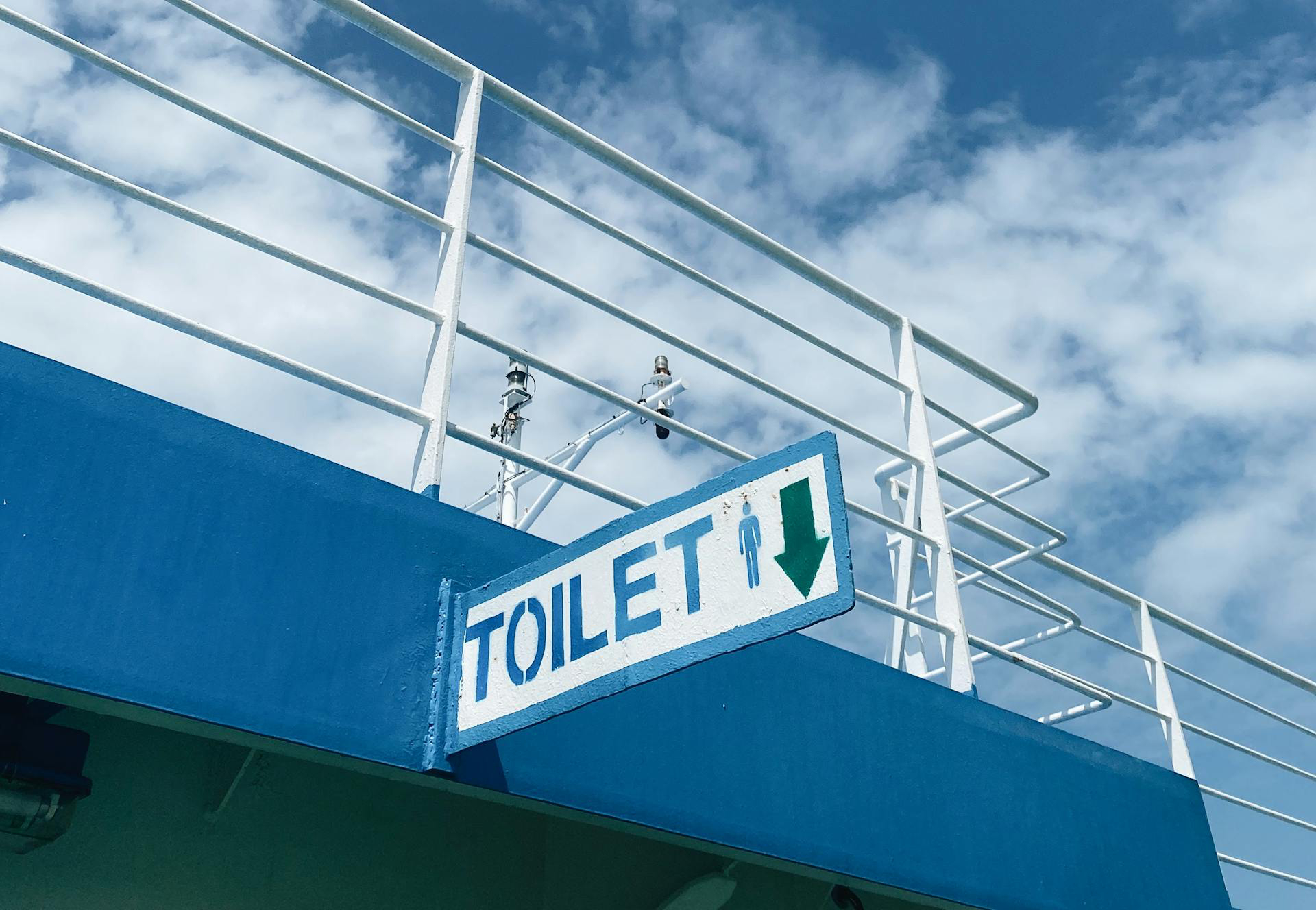 toilet direction sign
