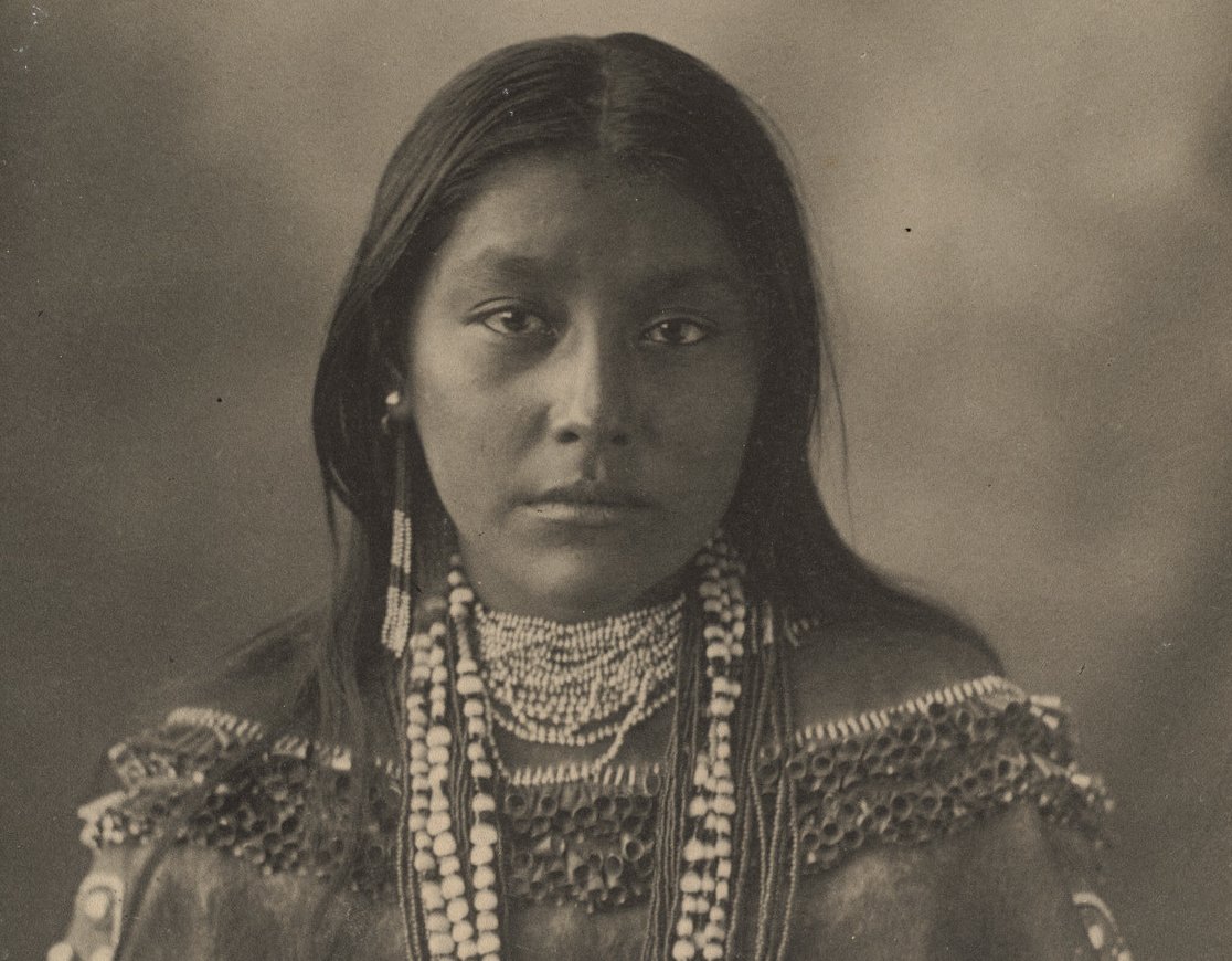 Grayscale Portrait Photo of Native American Teen in traditional clothing