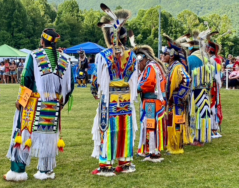 Photo of cherokee native american in traditional clothing.