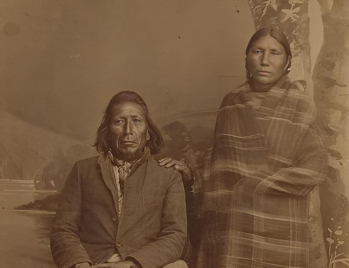 Grayscale Portrait Photo of Native American man and woman