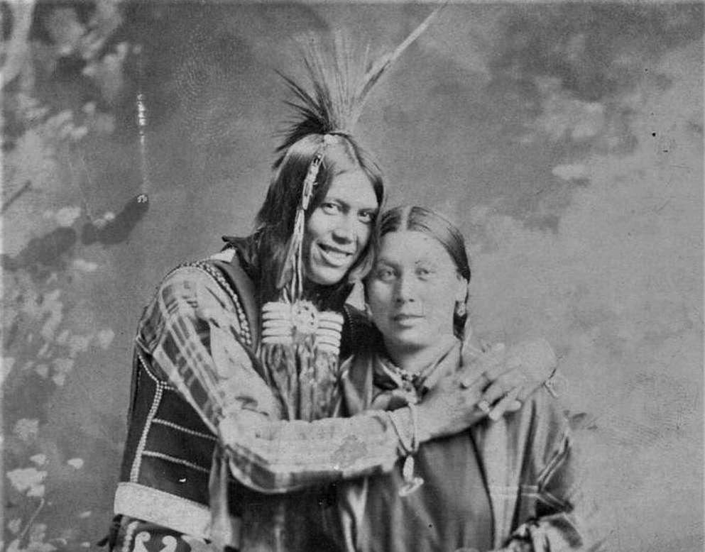 Grayscale Portrait Photo of Native American man and woman