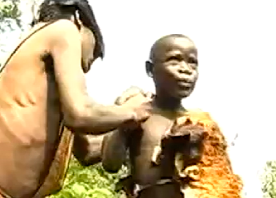 Screenshot of Batwa tribe people - from The Batwa Legacy (2011)
