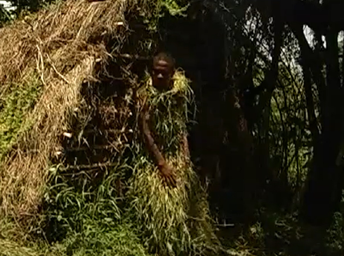 Screenshot of Batwa tribe people - from The Batwa Legacy (2011)