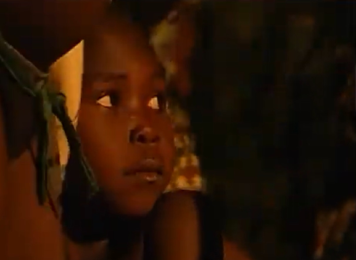 Screenshot of Batwa tribe kid - from The Batwa Legacy (2011)