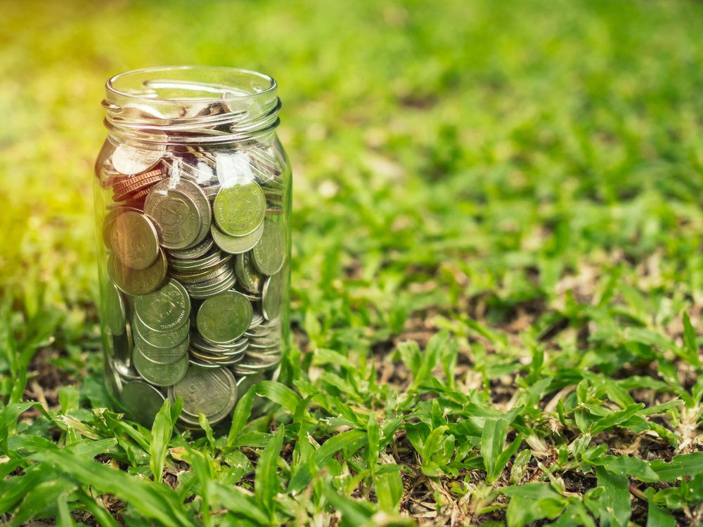 Coins in glass jar