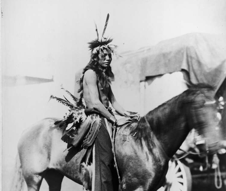 Buffalo Bill's Wild West Show, posed on horseback