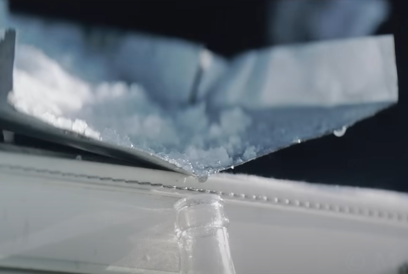 Screenshot of melting snow in the sun - from Society of the Snow (2023)