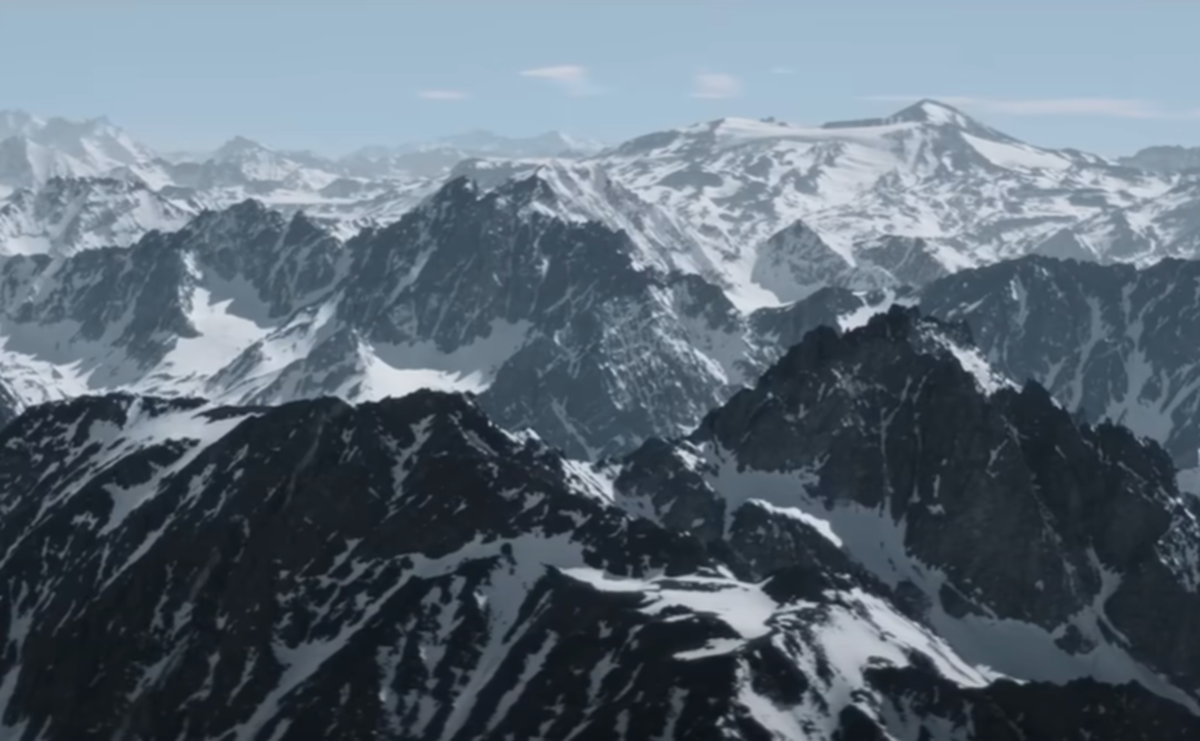Screenshot of the Andes from the air - from Society of the Snow (2023)