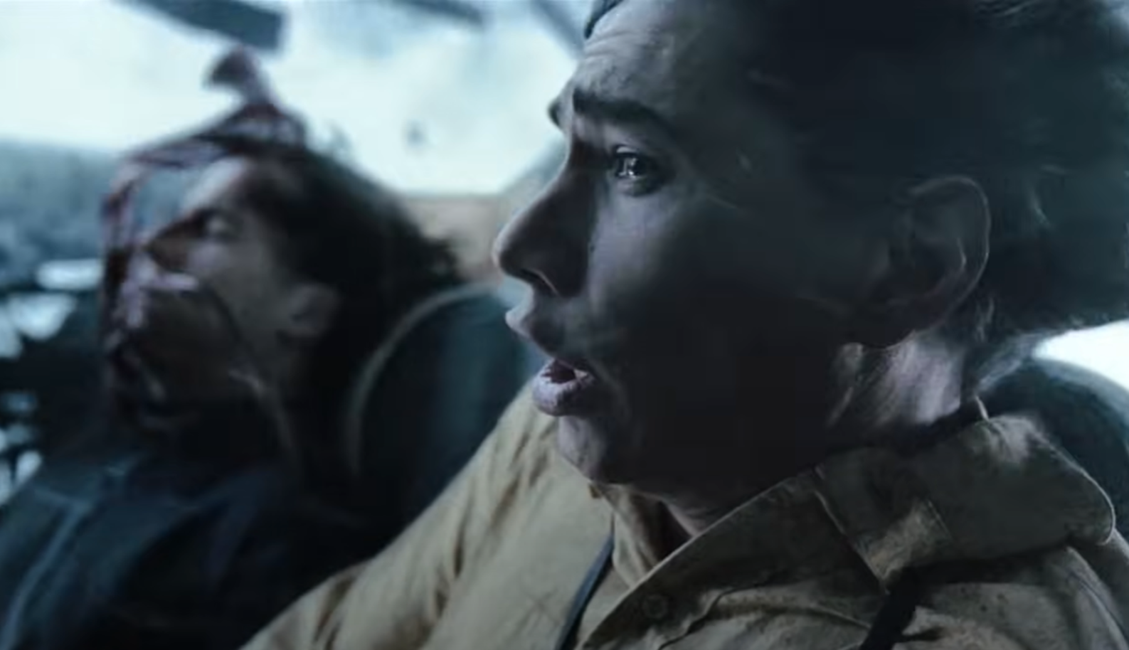 Screenshot of people looking scared in the falling plane - from Society of the Snow (2023)