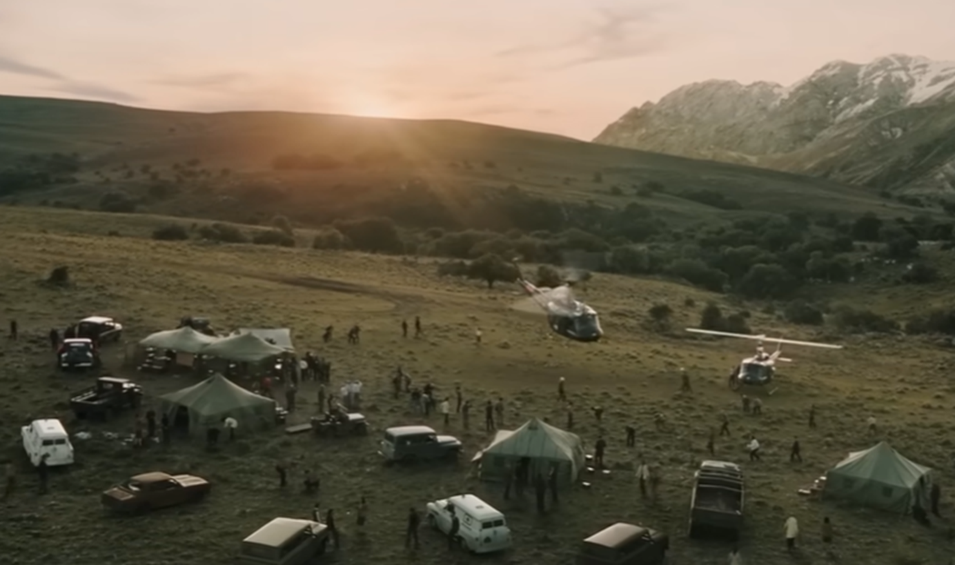 Screenshot of army helicopters landing in the camp - from Society of the Snow (2023)