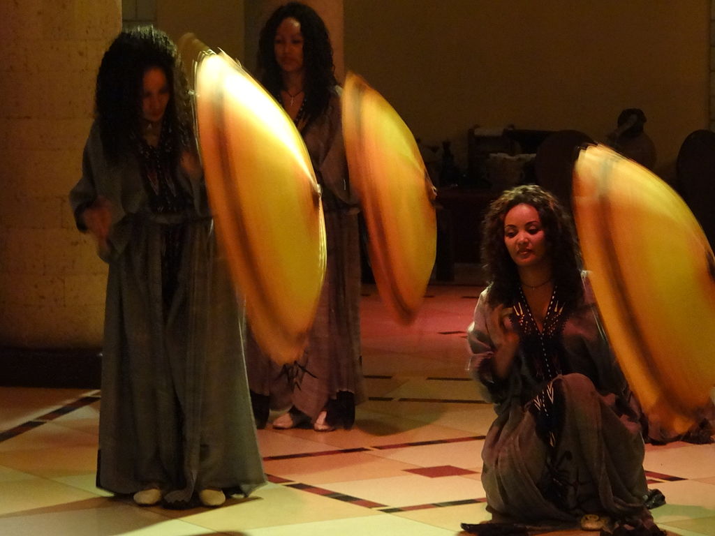 Habesha women in traditional attire performing a cultural dance