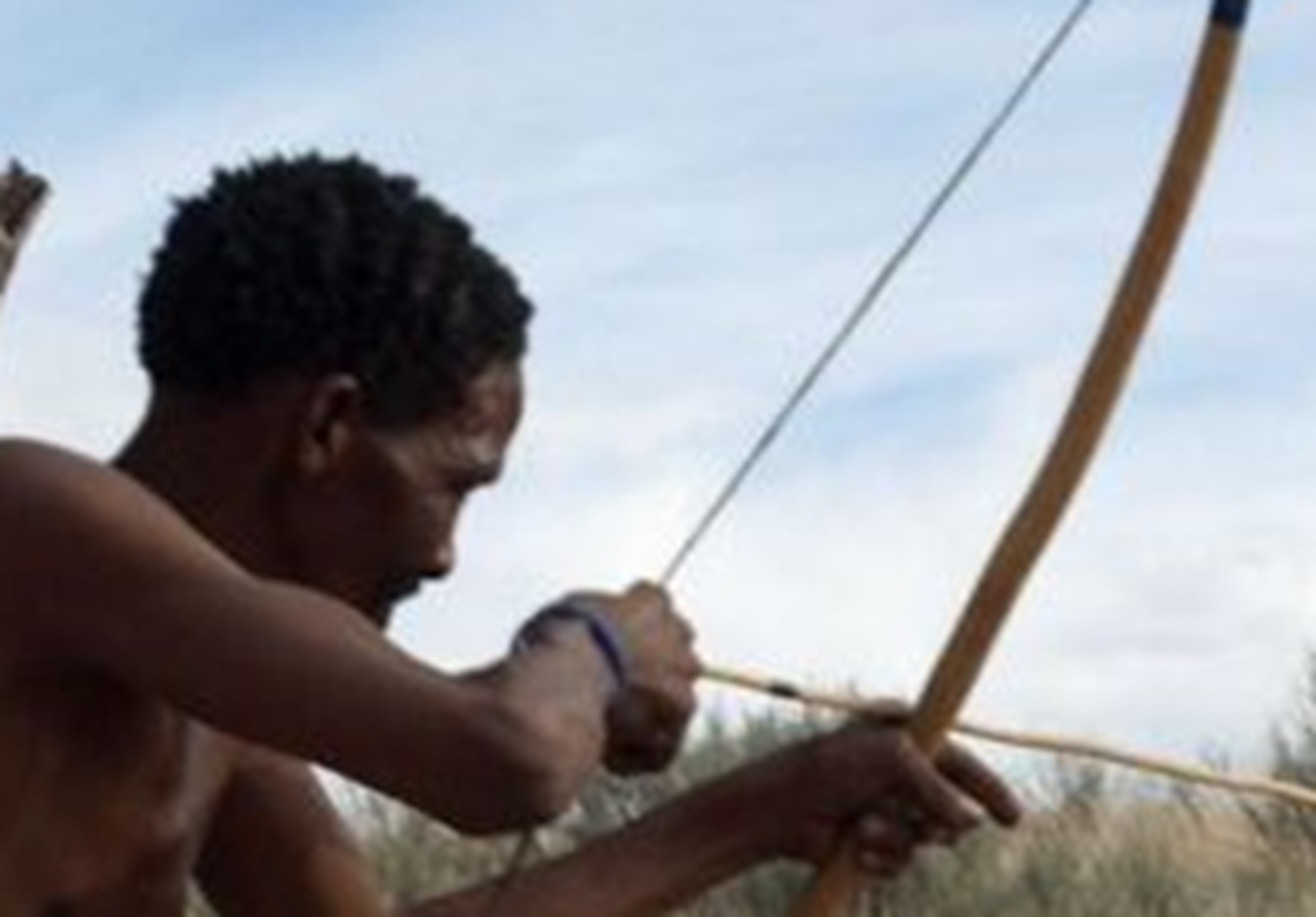 Bushman demostrating bow hunting