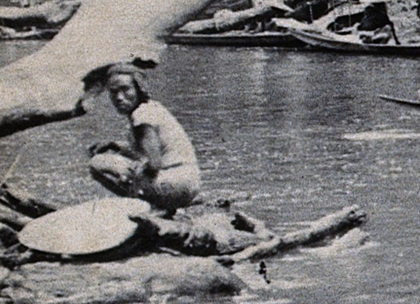 Malaysian tribe fishing on the Baram River.