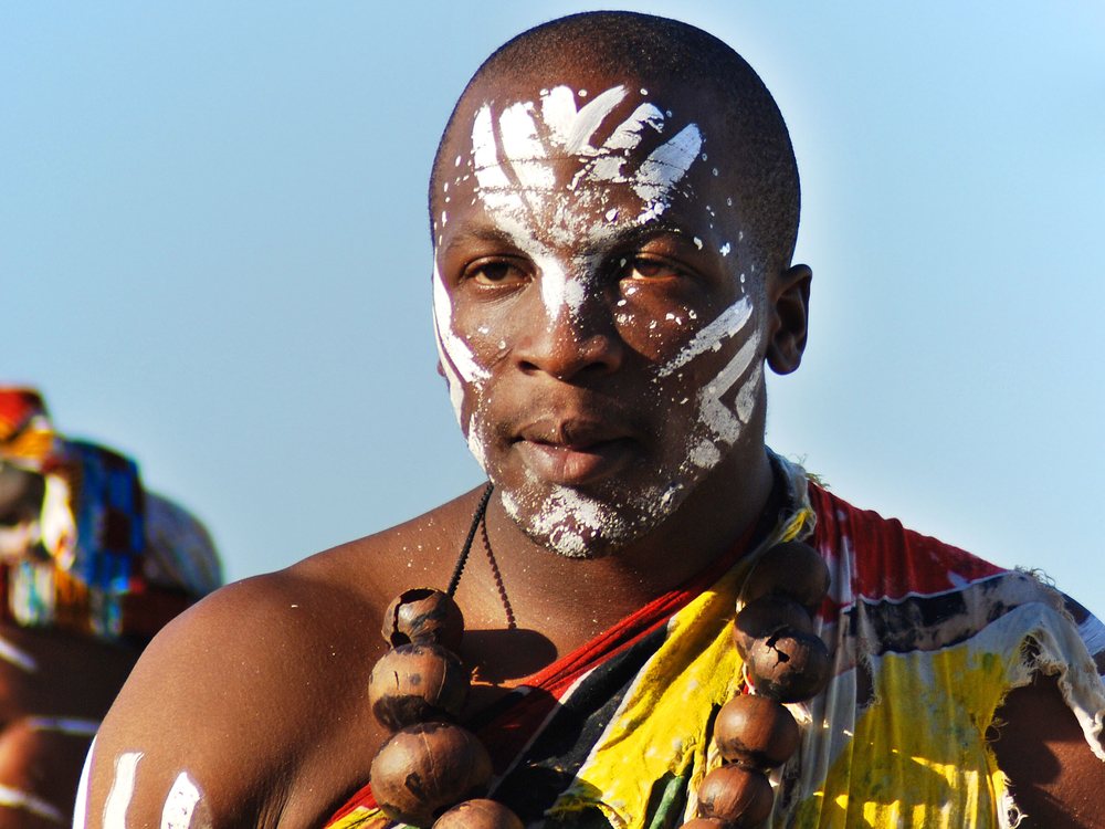 An young man wears traditional Zulu  clothing