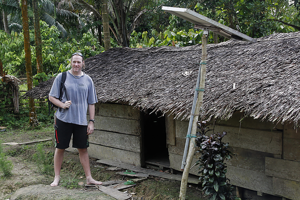 Tourist in Mentawai village