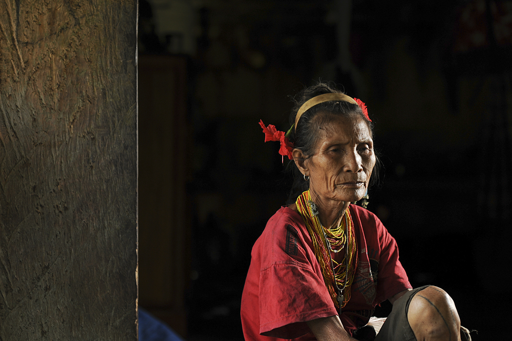 Mentawai woman in traditional decorations