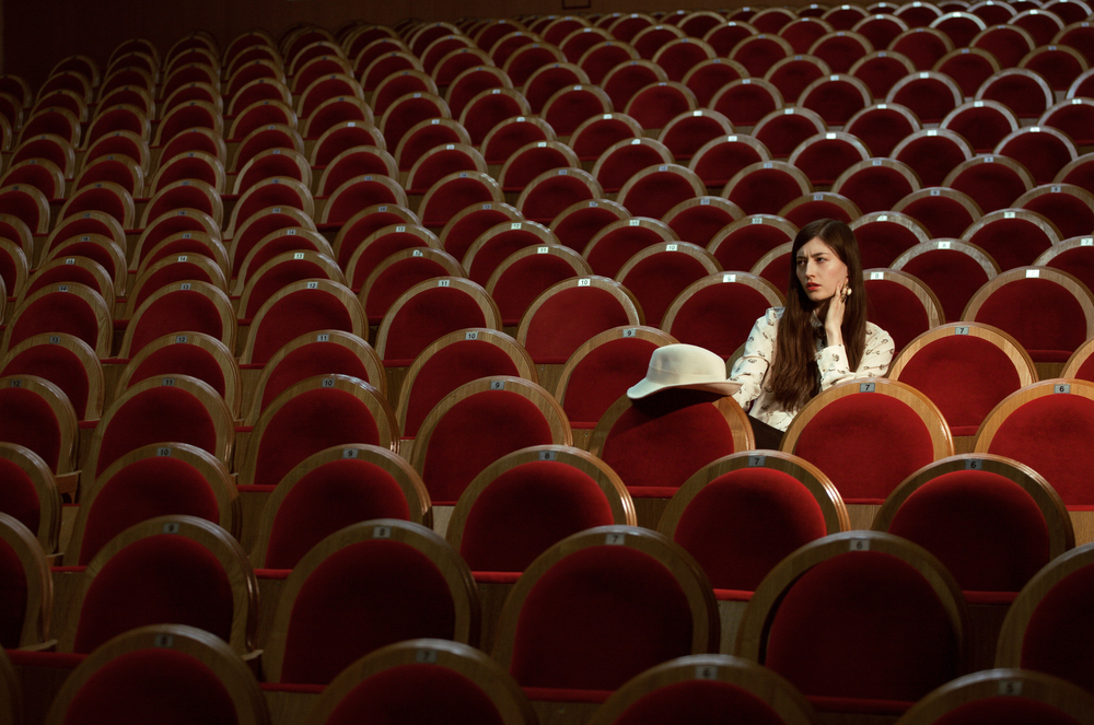 pretty girl in a movie theater