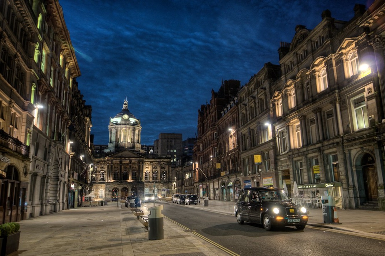 Street in Liverpool, England at night.