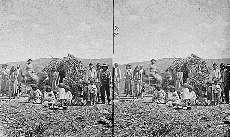 Apache camp, men with weapons