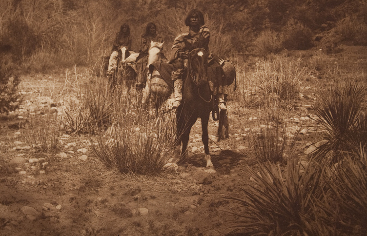 Apache people on horses