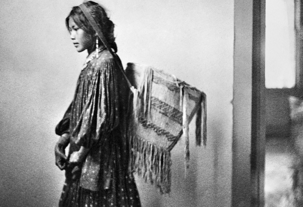 Apache girl with basket