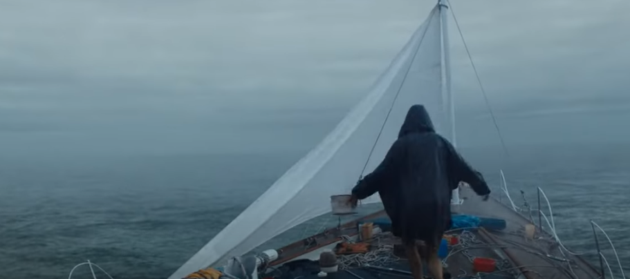 Woman on a rainy day in a boat