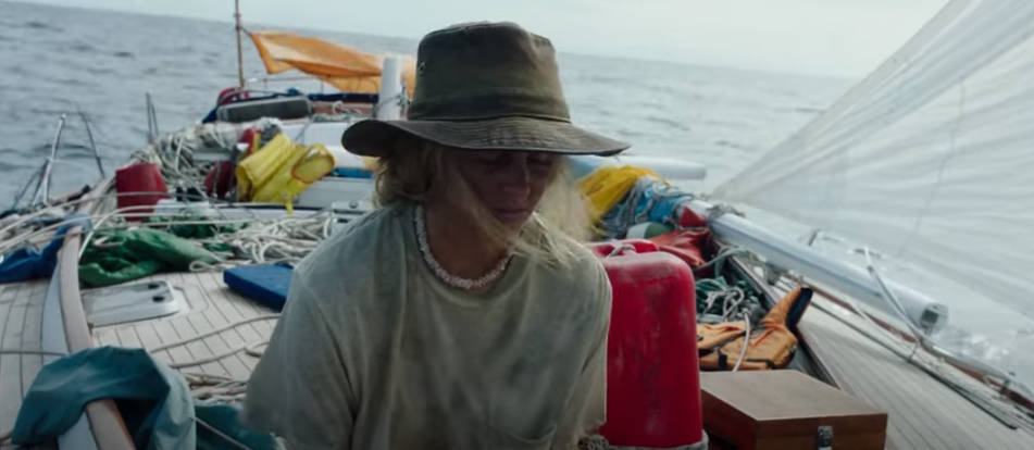 Woman with a hat on a boat