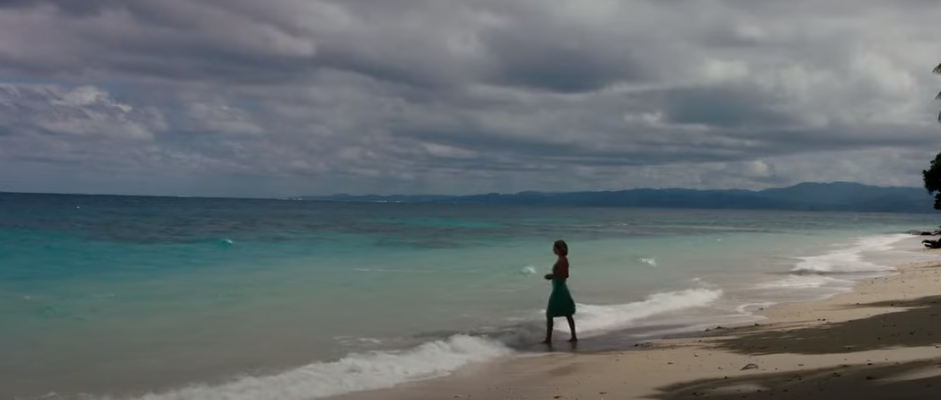 Woman standing near the sea