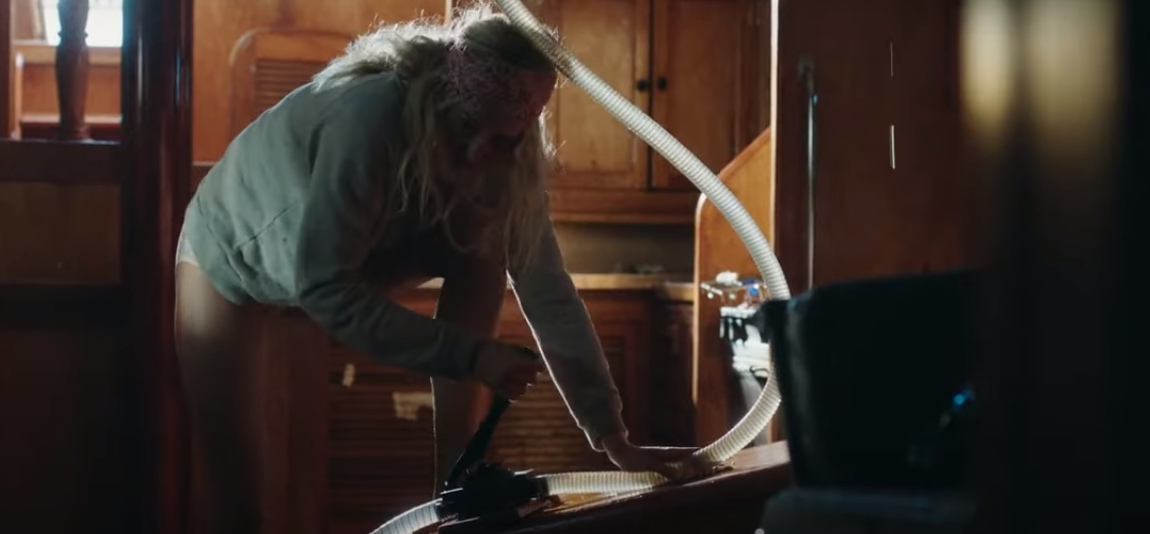 girl cleaning a boat