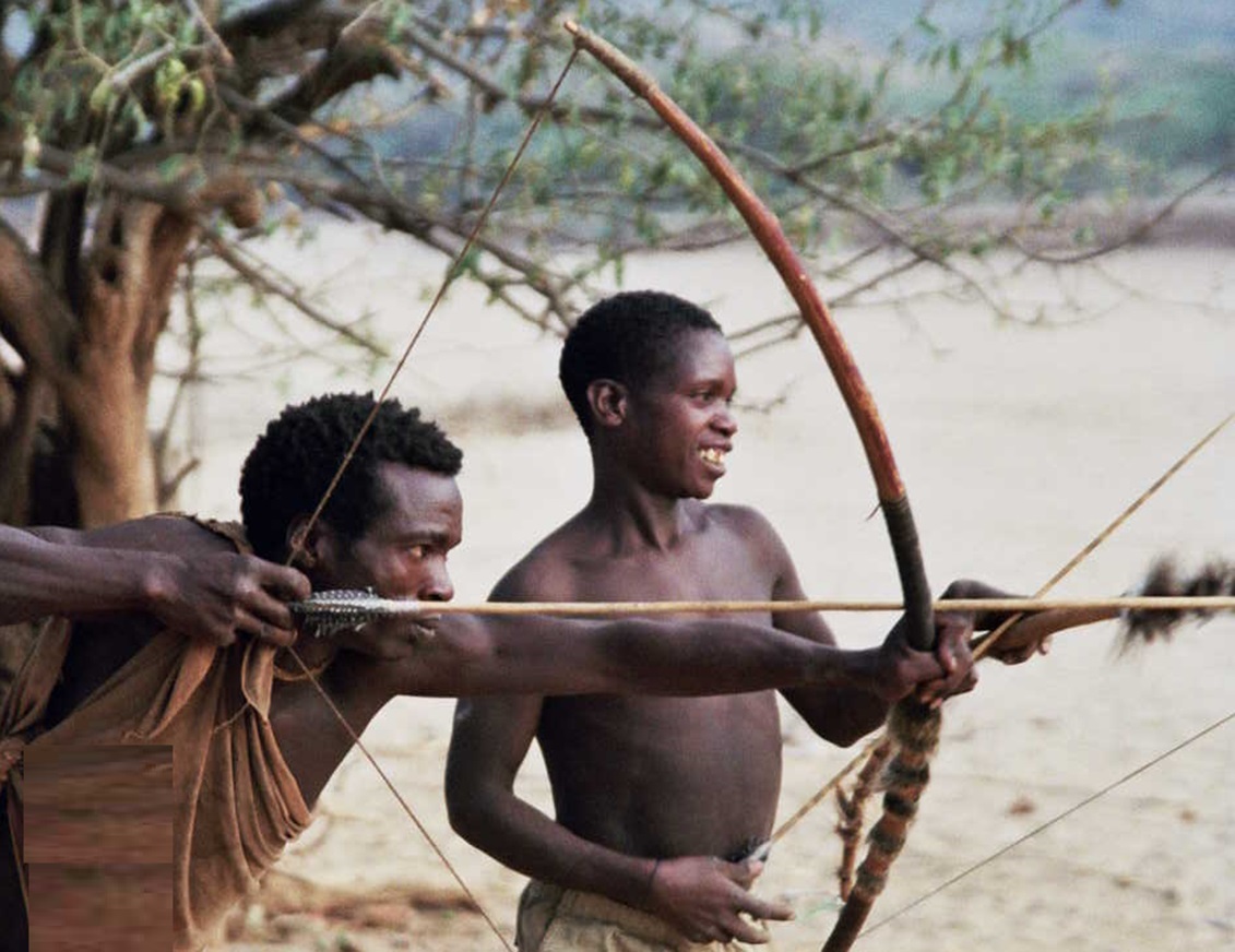 Hadzabe Men Practicing Bowing - 2007