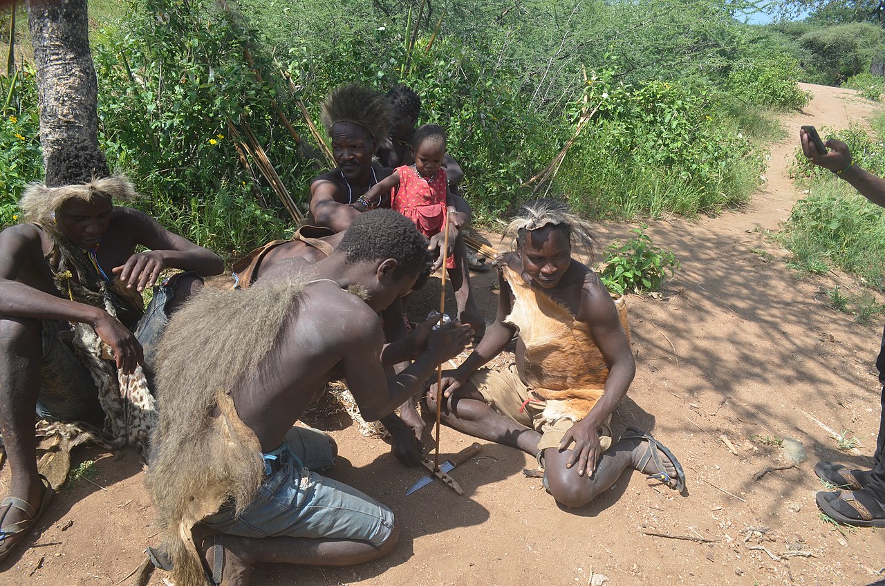Hadza people outside.