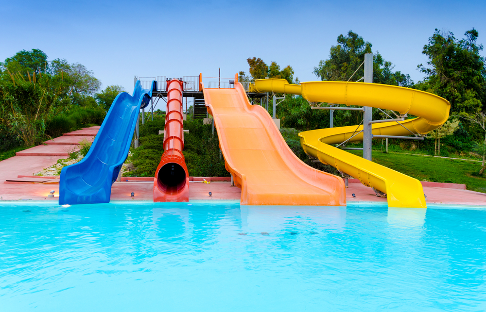 Empty colorful waterslides and pool