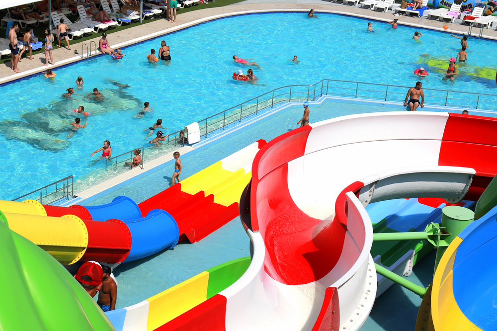 Colorful roller coasters in the picturesque water park