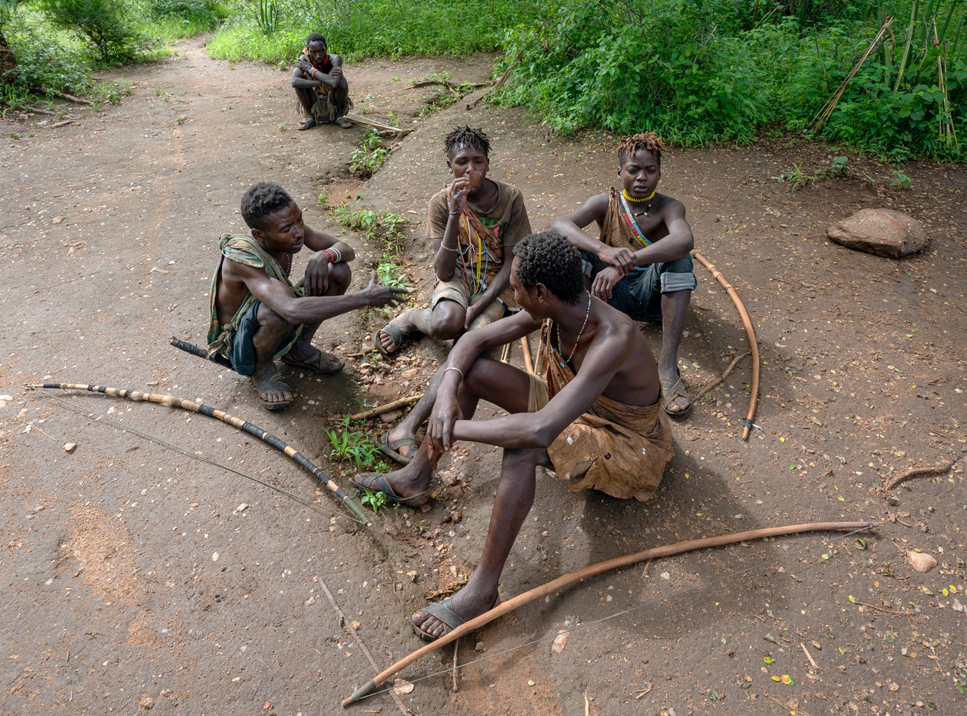 Hadzabe hunters are resting in shade - 2020