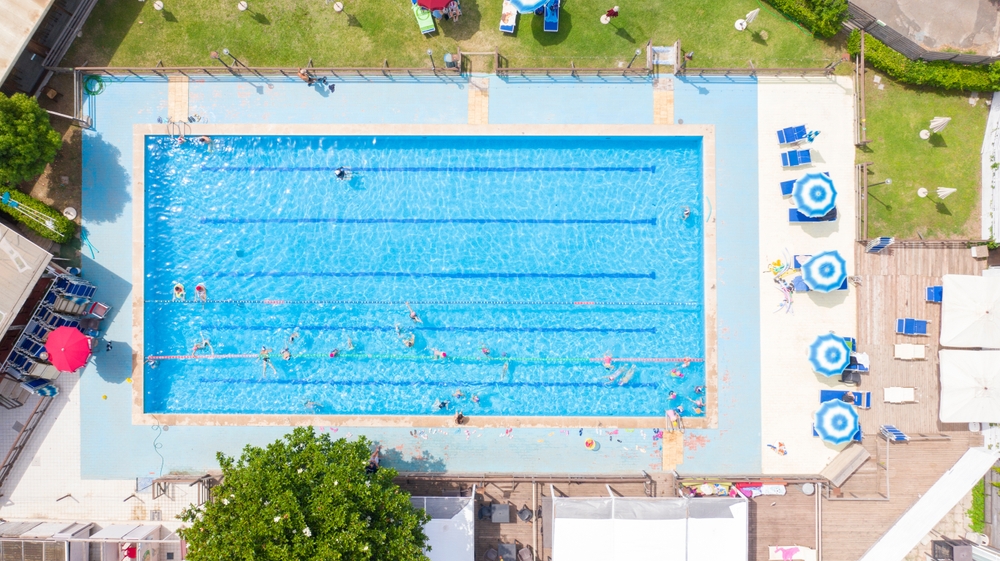 Perpendicular aerial view on a public swimming pool