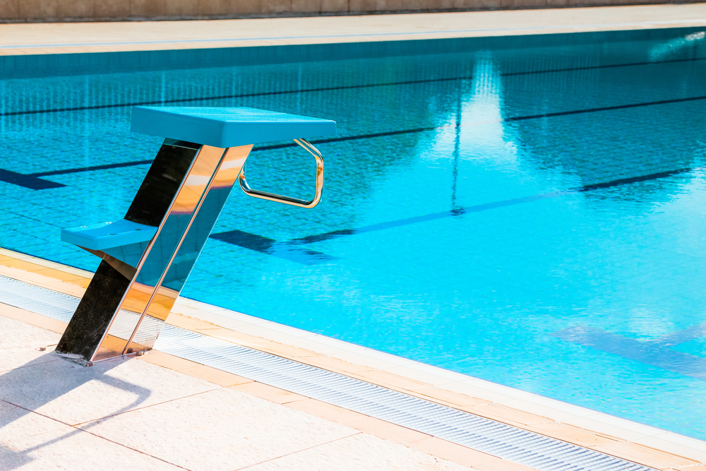 Close up of swimming pool starting block outdoors